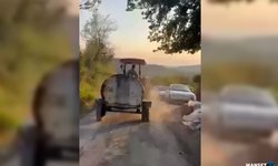 Patlak lastikle yangın bölgesine su taşıdı...