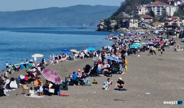 Güzel havanın tadını plajda çıkardılar...