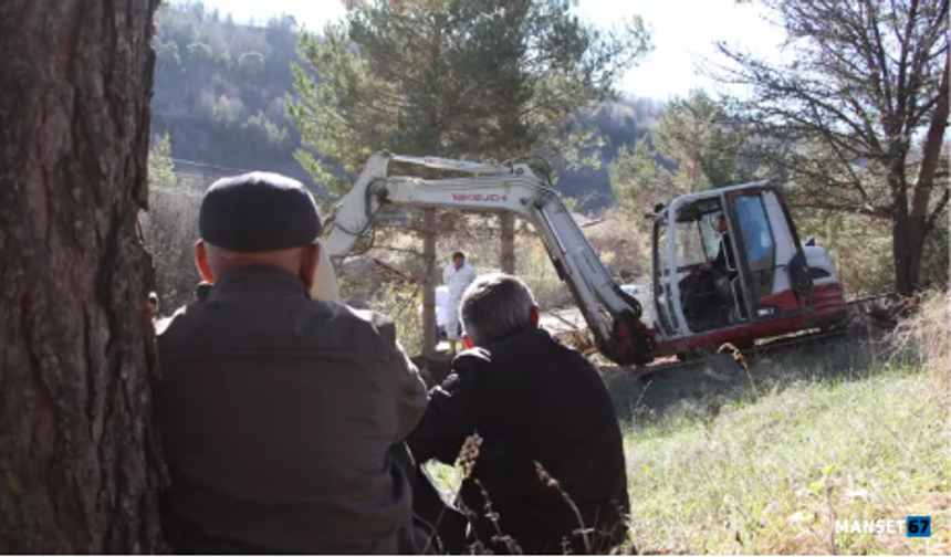 Su altında kalacak mezarlıktaki kabirler taşınıyor...