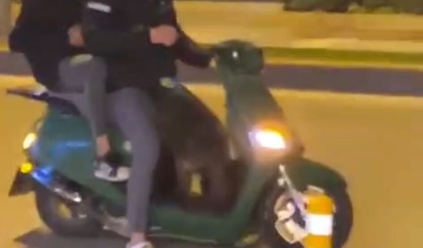 Sokak köpeğinin motor sevdası kamerada....